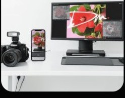 Camera and monitor on a desk